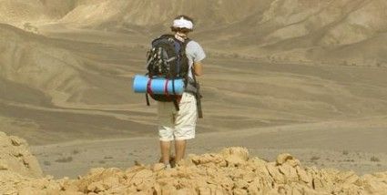 Backpacker and desert