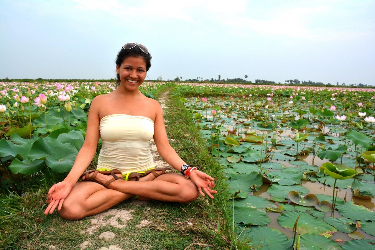 Lotus Pose with Lotus Flowers in Cambodia - Lucid Practice
